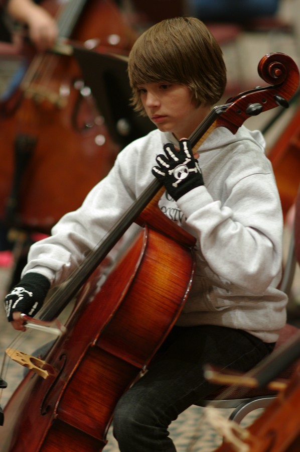 SYOA cellist in rehearsal at the 2012 conference