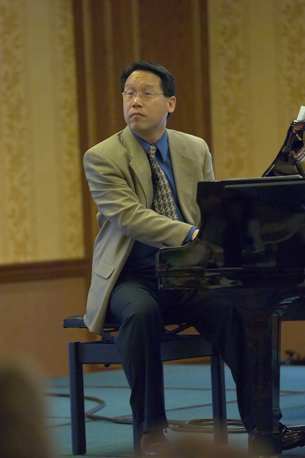 Brian Chung plays the piano at the 2006 SAA Conference
