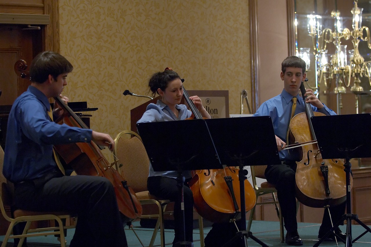 Bryant Hopkins, Olivia Burzynska-Hernandez, and Patrick Hopkins in the cello ensemble masterclass at the 2006 SAA Conference