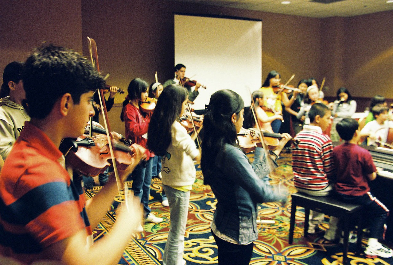 Latin American Suzuki Ensemble in rehearsal.