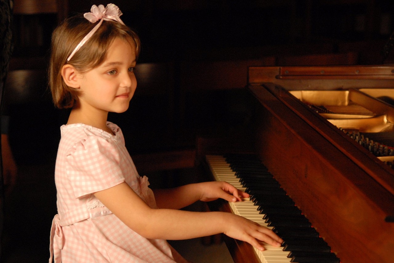 Young girl at the piano at the 2008 SAA Conference