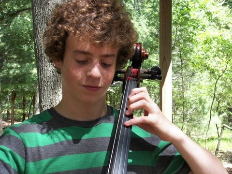 Cello student at Blue Lake Suzuki Family Camp