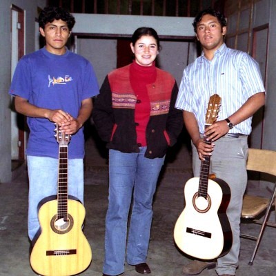 Guitar teacher Mercedes Vargas with students from Ica