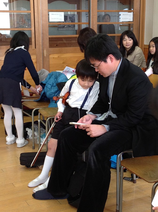 Student from Japan with his father, having a short break during one of Nancy Lokken’s classes