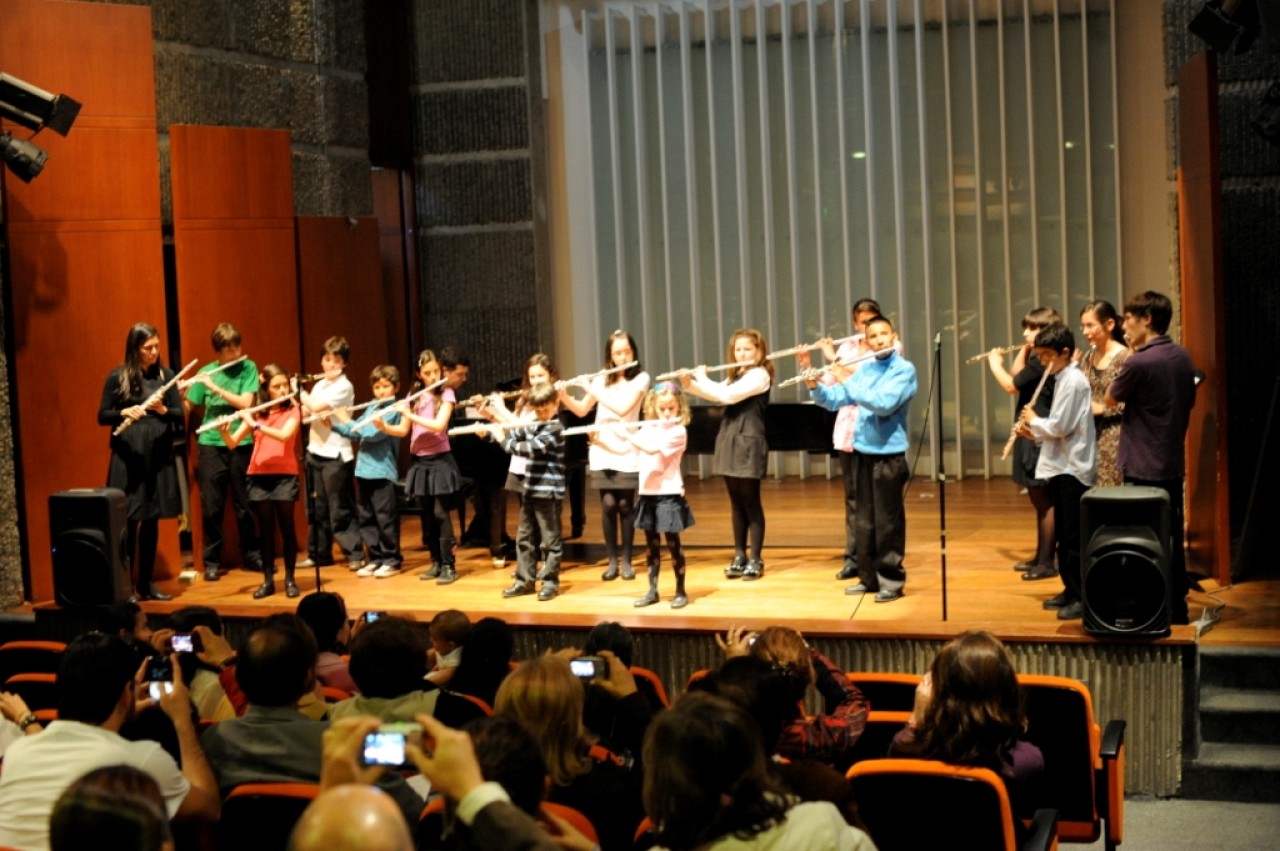 Student group in Bogota, with teacher Diana Bettin, performing at the concert where Nicolas was presented with his flute