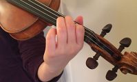 Balancing from the Center: Clearing the Path to Fluid Left Hand Technique for Violinists and Violists