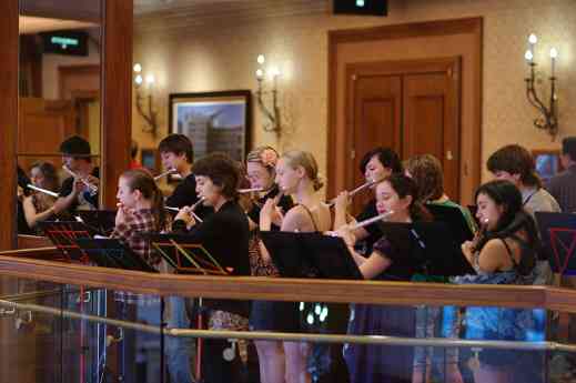 The Flute Performing Ensemble gives an impromptu performance on the balcony