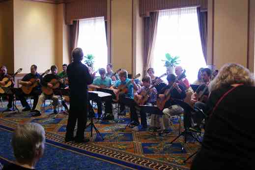 David Madsen conducts the guitar ensemble at the 2012 conference