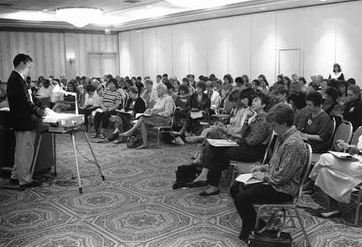 Attendees filled conference rooms for concurrent sessions on specific instrument topics and general sessions.