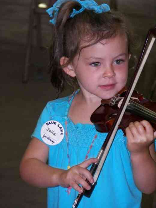 Violin student at Blue Lake Suzuki Family Camp