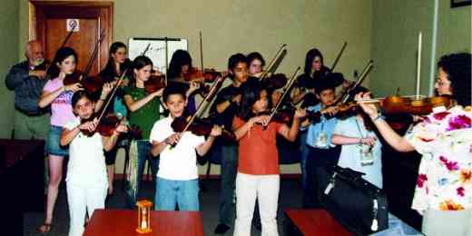 Alison Eldrege with violin class