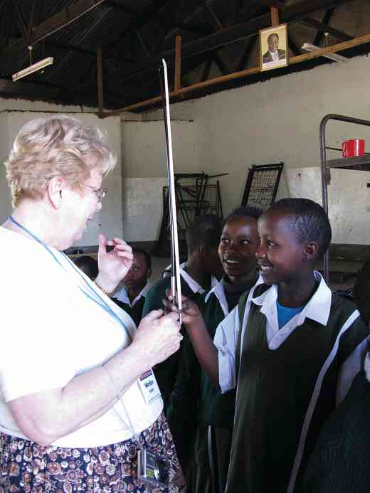 Marilyn Kesler works with students