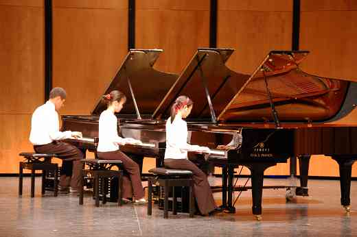 Three piano student performance