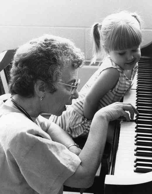 Doris Koppelman with piano student
