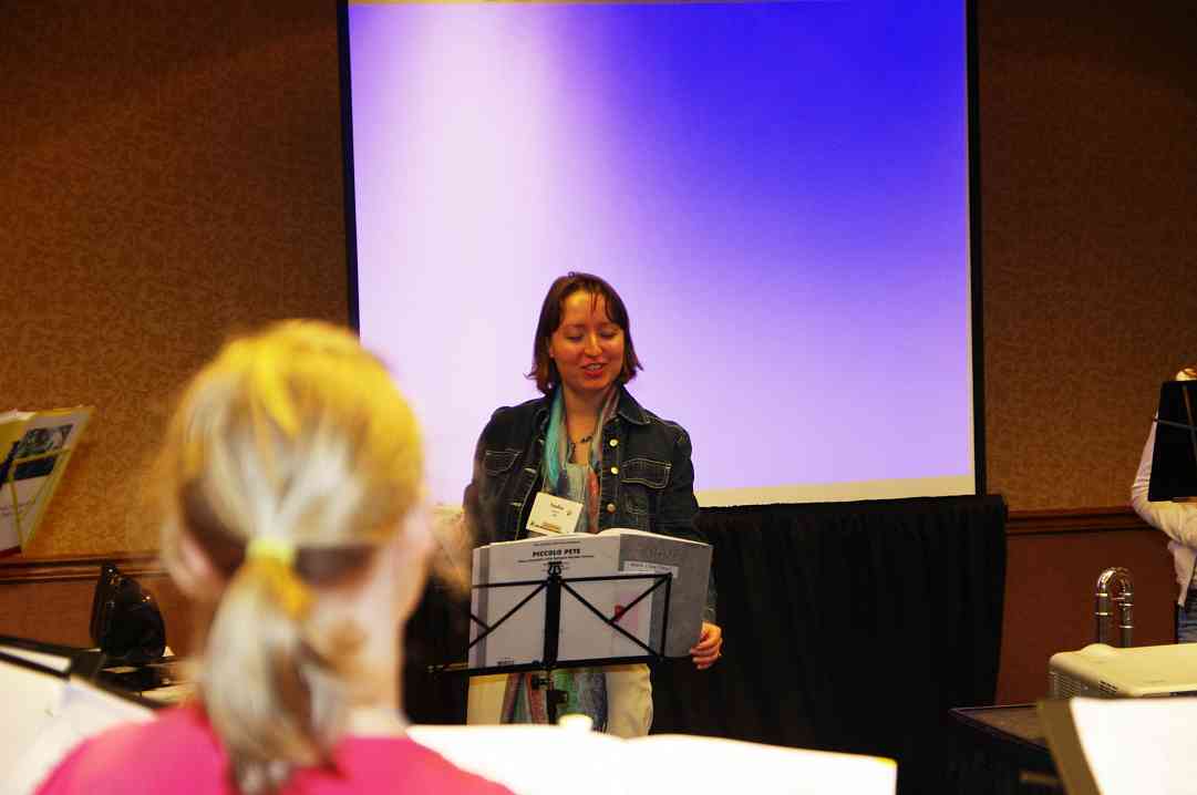 Sasha Garver conducts a Flute Performing Ensemble rehearsal at the 2010 Conference