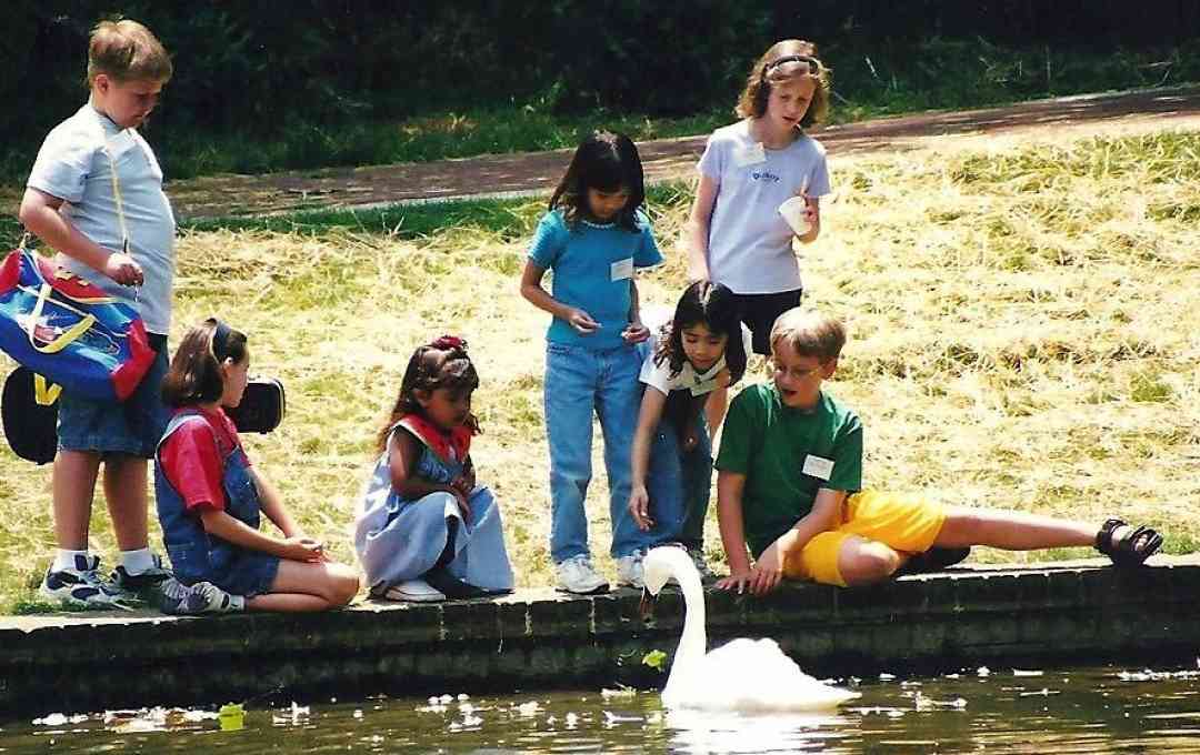 Students by the pond at Virgina Suzuki Institute