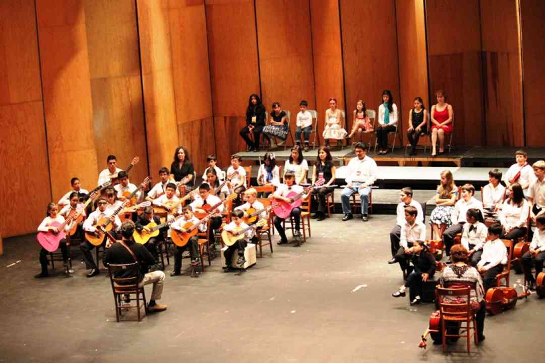 Guitarists perform at the Teatro Juarez