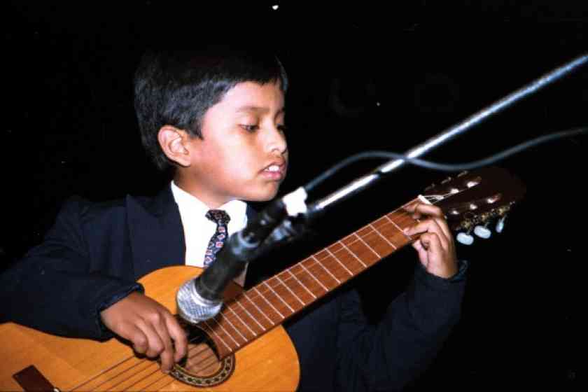 Young guitarist in concert