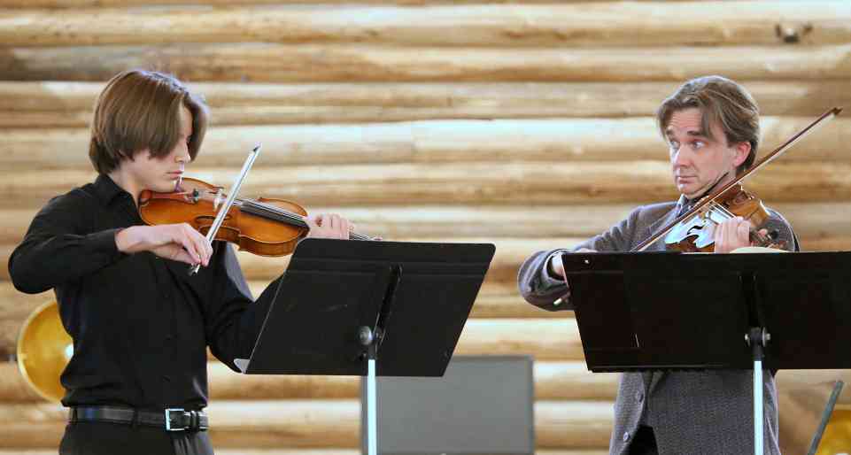 The author (right) performing with his student Rei Rasmussen.
