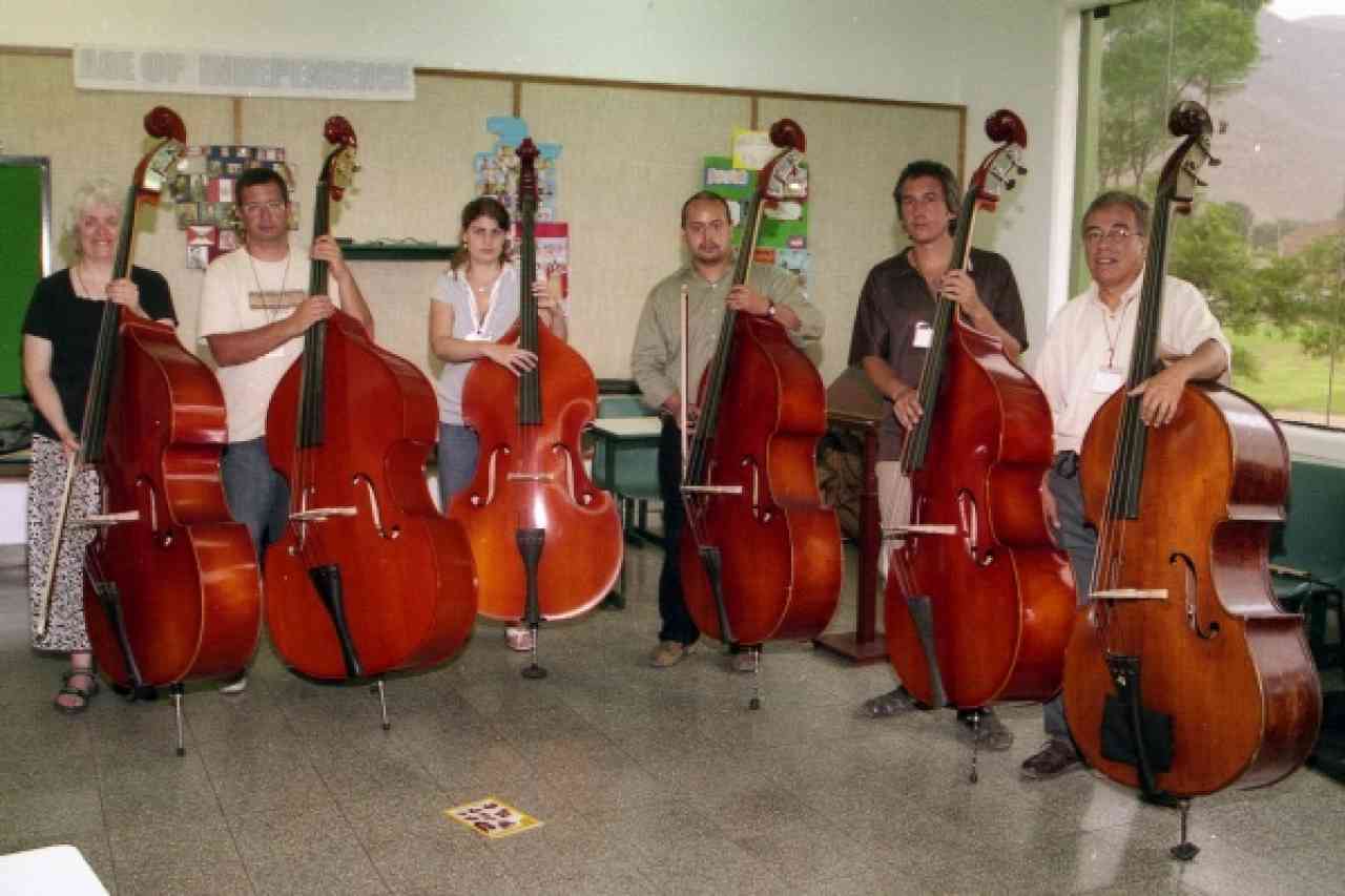 Virginia Dixon and her six double bass trainees