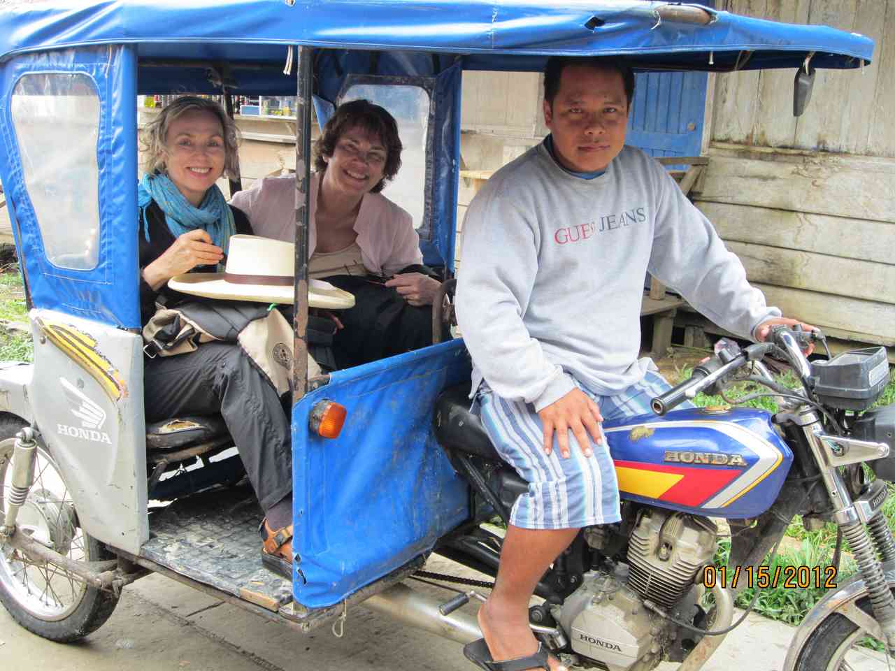 Mary and Nancy with Abelardo in his three-wheeled Iquitos taxi